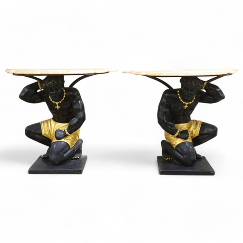 4 - An impressive pair of Blackamoor console tables, shaped and moulded coloured marble tops, supported ... 