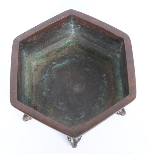 66 - A Chinese patinated bronze incense burner of hexagonal form on 6 cast feet, impressed seal mark, dia... 