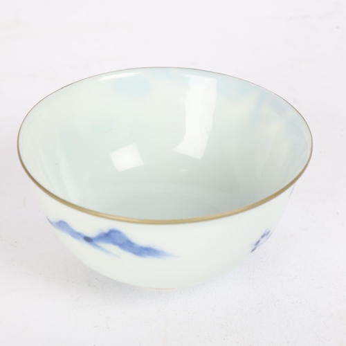 72 - A Chinese blue and white porcelain bowl with metal rim and 2 character mark, diameter 11cm