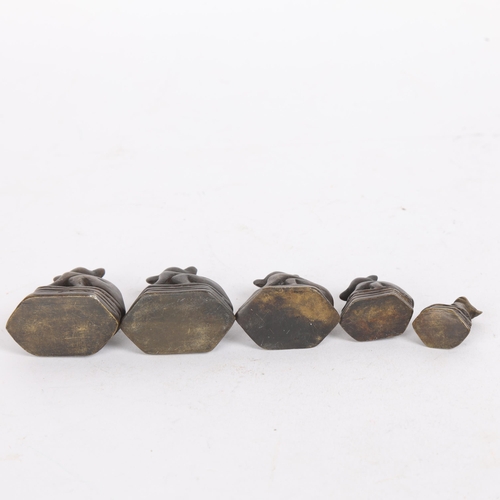 79 - A group of 4 Chinese miniature bronze animal seals