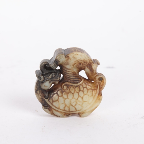 82 - A Chinese relief carved jade turtle design pendant, length 5cm