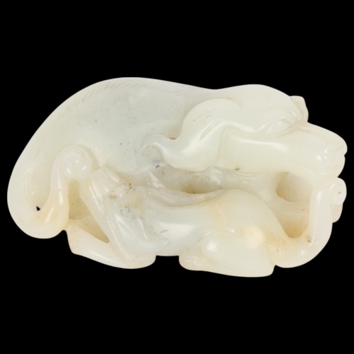 83 - A Chinese relief carved jade buffalo and calf, Qing Dynasty, length 7cm