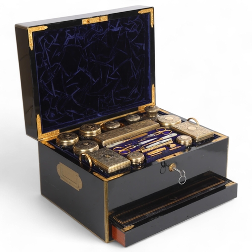 An exceptionally fine and complete Victorian travelling dressing case by F West, Manufacturer to Her Majesty and The Royal Family, No. 1 St James's Street, London, the brass-bound ebonised case extensively fitted with original accoutrements, numerous cut-glass jars with engraved silver-gilt tops, silver-mounted inkwells, mother-of-pearl handled manicure items, propelling pencil/dip pen with bloodstone seal top, sewing items and engraved silver beaker, the vanity case cover having a secret compartment concealing a leather-covered dressing table mirror and hand mirror, the vanity case also having a secret lower drawer, opened using an implement within the lock mechanism, opening to reveal a leather ledger and further jewellery tray with velvet lining, hallmarks for Abraham Brownett, London 1866, case measures 37cm x 27.5cm, height 21cm, in original brown leather outer case