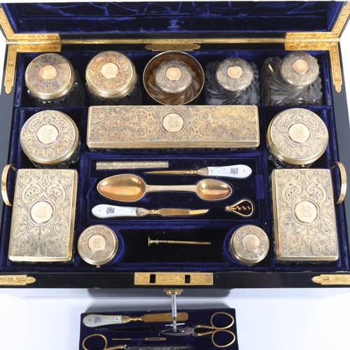 9 - An exceptionally fine and complete Victorian travelling dressing case by F West, Manufacturer to Her... 