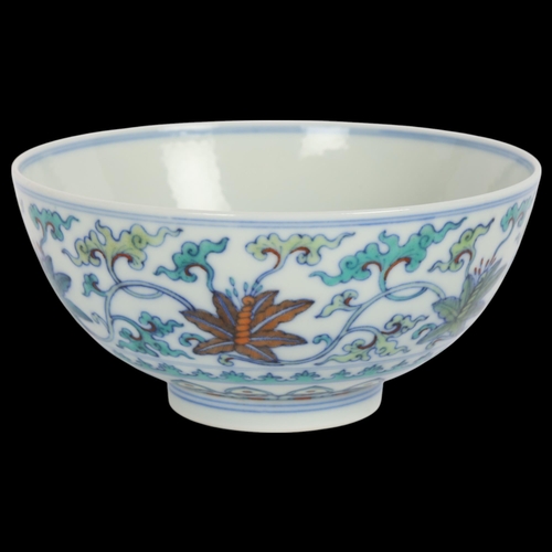 91 - A Chinese Doucai porcelain bowl with Qianlong mark, diameter 12cm, height 6cm