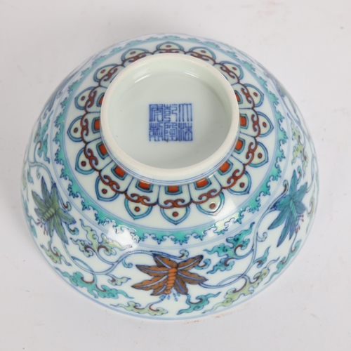 91 - A Chinese Doucai porcelain bowl with Qianlong mark, diameter 12cm, height 6cm