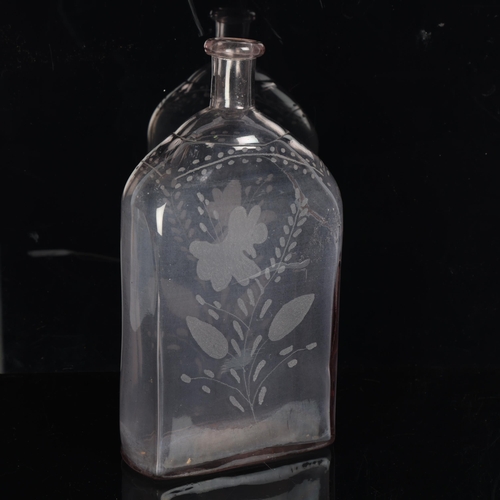 97 - An 18th/19th century Swedish box decanter/bottle, purple tinged glass engraved with flower and folia... 