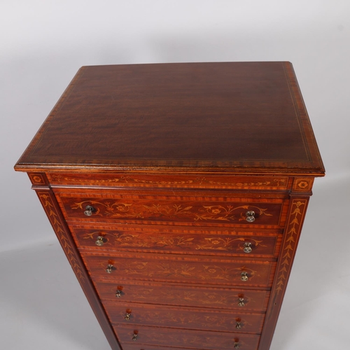 36 - A fine quality Edwardian marquetry inlaid mahogany Wellington chest of 7 drawers, by James Shoolbred... 