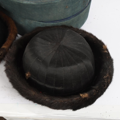 39A - 2 Chinese fur-trimmed winter court hats, in an original blue fabric-covered silk-lined hat box