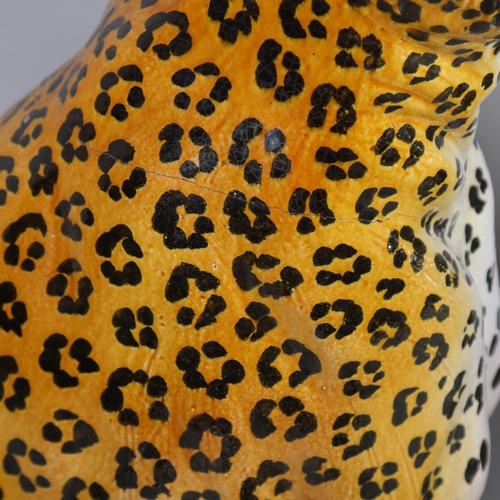 40 - A large pair of Italian floor standing pottery cheetahs, mid-20th century, height 84cm