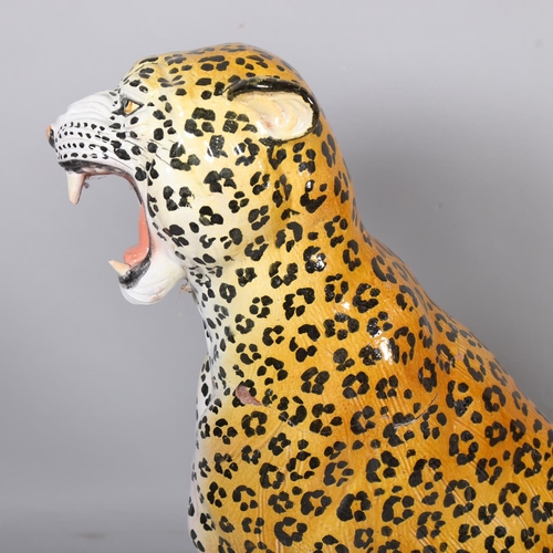 40 - A large pair of Italian floor standing pottery cheetahs, mid-20th century, height 84cm