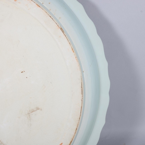 41 - A massive Chinese celadon glaze porcelain charger, 5 character text mark to the rim, diameter 95cm