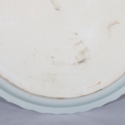 41 - A massive Chinese celadon glaze porcelain charger, 5 character text mark to the rim, diameter 95cm