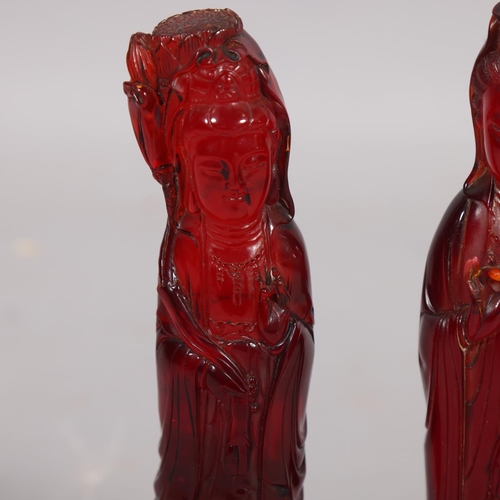 42 - 2 similar Chinese amber figures on carved wood bases, height 32cm