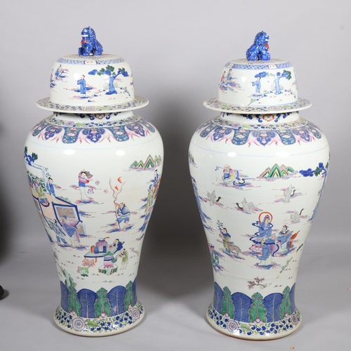 44 - A massive pair of Chinese white glaze porcelain jars and covers, with hand painted figures and dog o... 