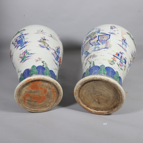 44 - A massive pair of Chinese white glaze porcelain jars and covers, with hand painted figures and dog o... 