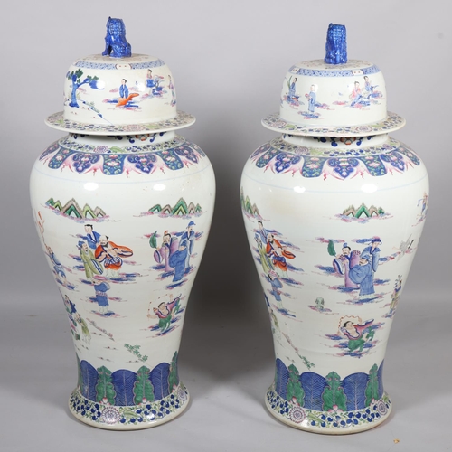 44 - A massive pair of Chinese white glaze porcelain jars and covers, with hand painted figures and dog o... 