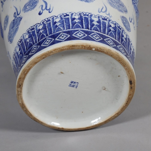 45 - A large Chinese blue and white porcelain vase, with relief moulded dragons, height 91cm