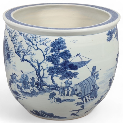 46 - A large Chinese blue and white porcelain fish bowl, decorated with boats among the reeds, diameter 5... 