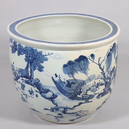 46 - A large Chinese blue and white porcelain fish bowl, decorated with boats among the reeds, diameter 5... 