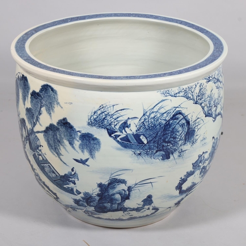 46 - A large Chinese blue and white porcelain fish bowl, decorated with boats among the reeds, diameter 5... 