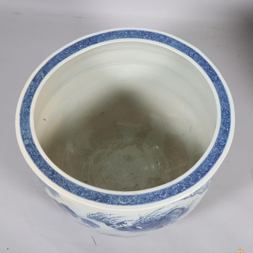 46 - A large Chinese blue and white porcelain fish bowl, decorated with boats among the reeds, diameter 5... 