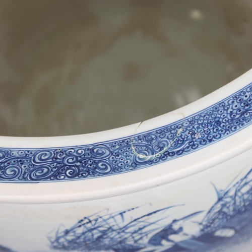 46 - A large Chinese blue and white porcelain fish bowl, decorated with boats among the reeds, diameter 5... 