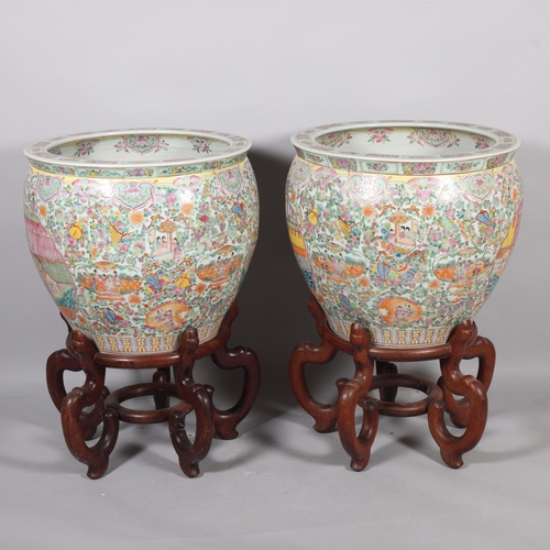 49 - A massive pair of Chinese famille rose porcelain fish bowls, with enamel decoration inside and out, ... 