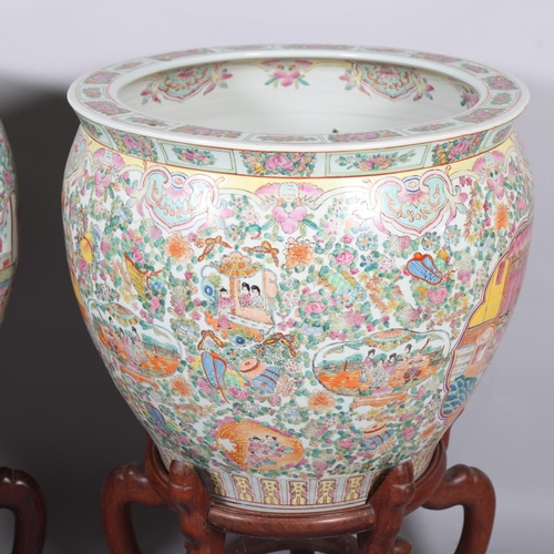 49 - A massive pair of Chinese famille rose porcelain fish bowls, with enamel decoration inside and out, ... 