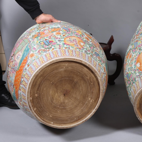 49 - A massive pair of Chinese famille rose porcelain fish bowls, with enamel decoration inside and out, ... 