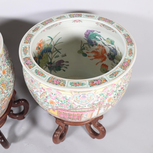 49 - A massive pair of Chinese famille rose porcelain fish bowls, with enamel decoration inside and out, ... 