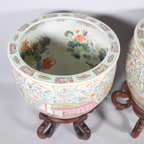 49 - A massive pair of Chinese famille rose porcelain fish bowls, with enamel decoration inside and out, ... 