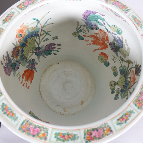 49 - A massive pair of Chinese famille rose porcelain fish bowls, with enamel decoration inside and out, ... 