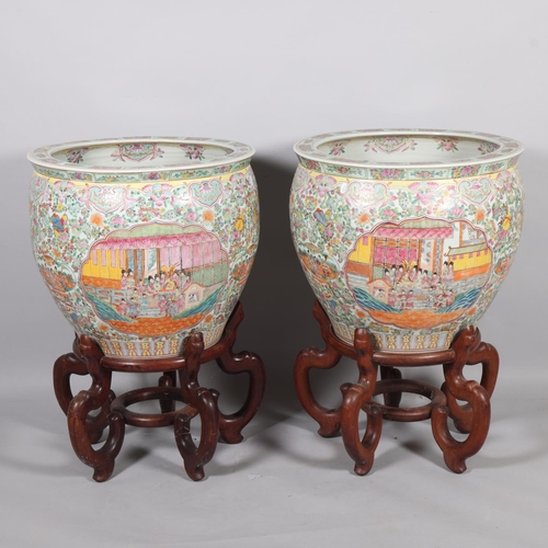 49 - A massive pair of Chinese famille rose porcelain fish bowls, with enamel decoration inside and out, ... 