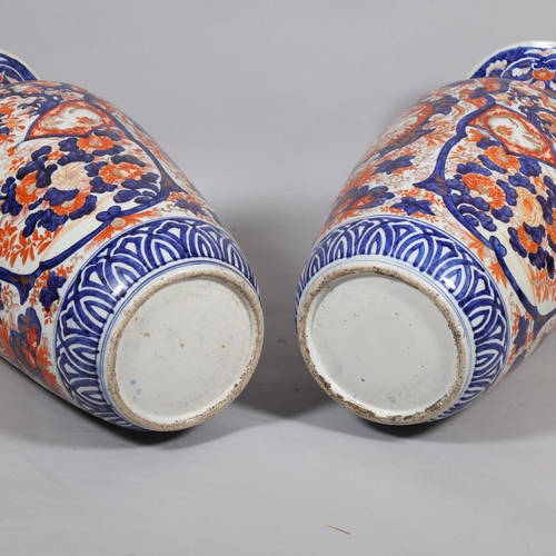 53 - A massive pair of Chinese Imari pattern porcelain vases, blue red and gilt on white ground, height 7... 