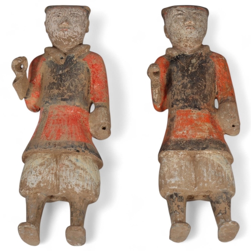 60 - A pair of Chinese clay standing figures, height 46cm