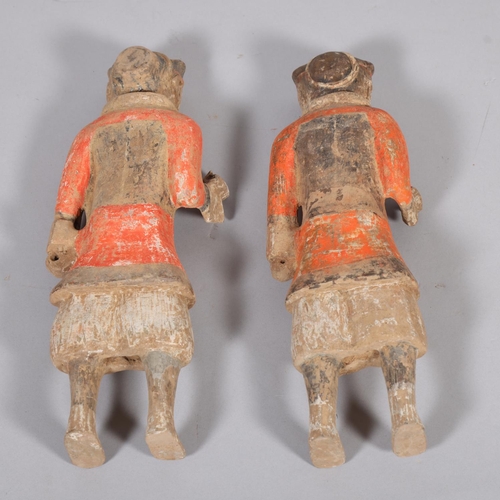 60 - A pair of Chinese clay standing figures, height 46cm