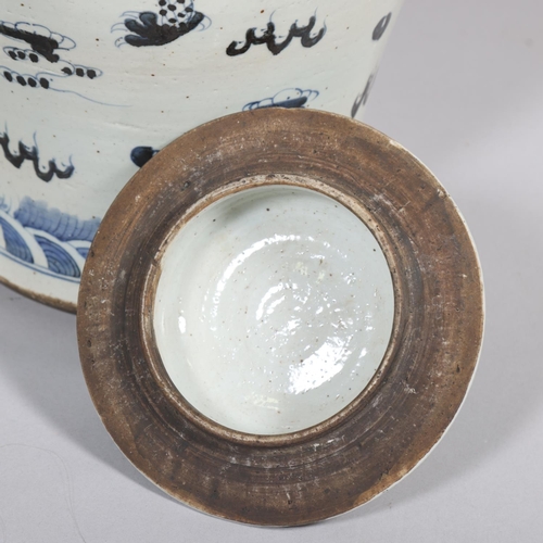 61 - A pair of Chinese blue and white jars and covers, with dragon decoration, height 55cm