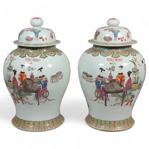 63 - A large pair of Chinese porcelain jars and covers, with enamel figures and text, height 61cm