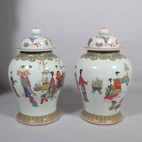 63 - A large pair of Chinese porcelain jars and covers, with enamel figures and text, height 61cm