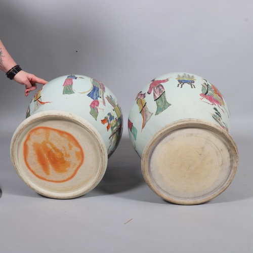 63 - A large pair of Chinese porcelain jars and covers, with enamel figures and text, height 61cm