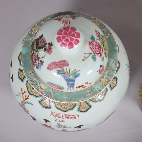 63 - A large pair of Chinese porcelain jars and covers, with enamel figures and text, height 61cm