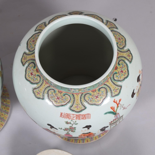 63 - A large pair of Chinese porcelain jars and covers, with enamel figures and text, height 61cm