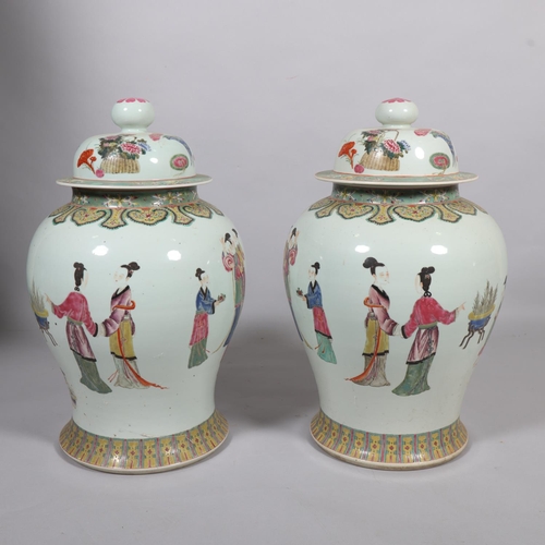 63 - A large pair of Chinese porcelain jars and covers, with enamel figures and text, height 61cm