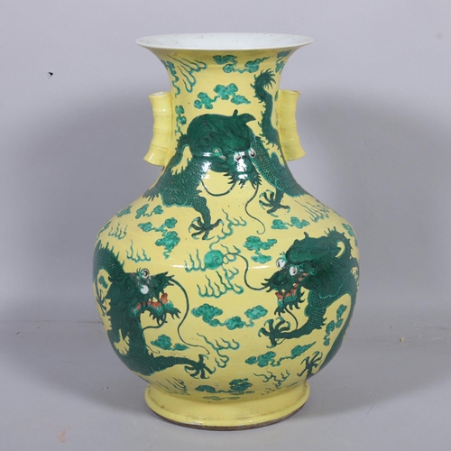 64 - A large Chinese yellow ground porcelain vase, with green enamel dragon decoration, height 56cm