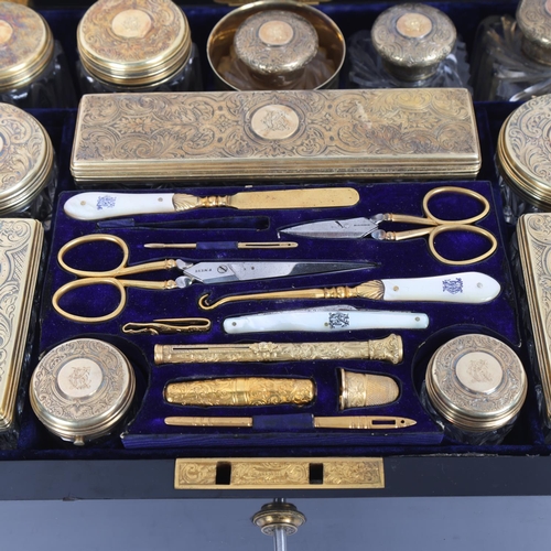 9 - An exceptionally fine and complete Victorian travelling dressing case by F West, Manufacturer to Her... 