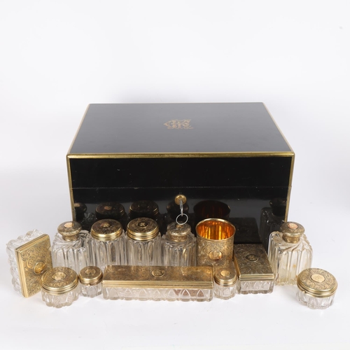 9 - An exceptionally fine and complete Victorian travelling dressing case by F West, Manufacturer to Her... 