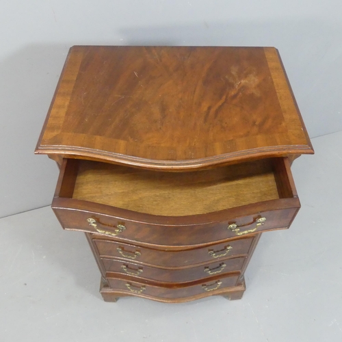 2141 - A reproduction cross-banded mahogany serpentine-fronted chest of six drawers. Width 62cm, height 99c... 