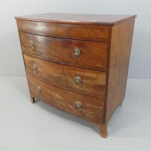 2143 - A Georgian mahogany bow-front chest of three long drawers. Width 95cm, height 92cm, depth 54cm.