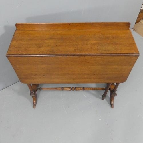 2144 - An early 20th century oak drop-leaf console table, with raised back and turned stretcher. Width 84cm... 